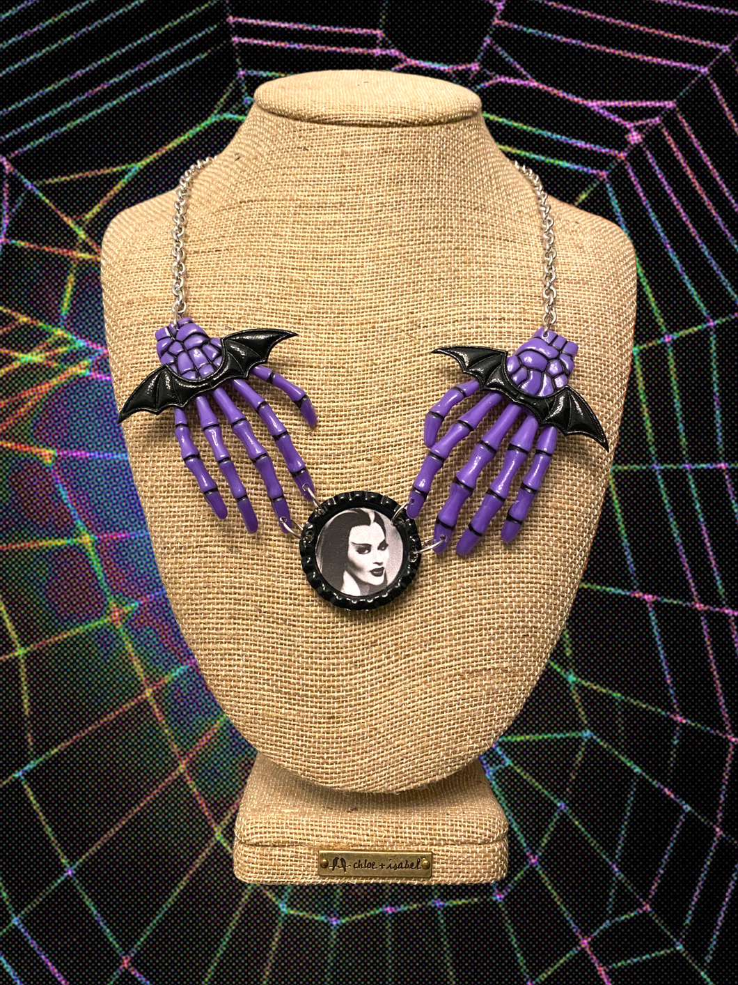 Lily purple skeleton hand necklace
