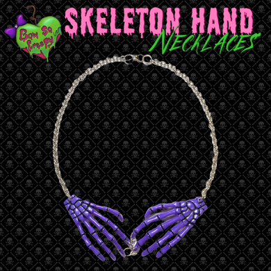 Purple skeleton hand necklace